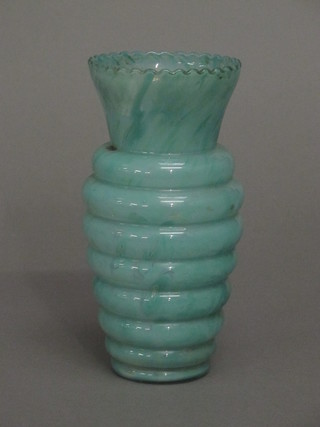 A turquoise ribbed glass vase 7"