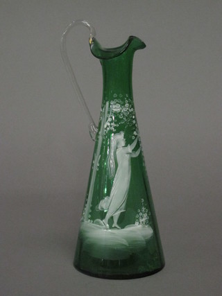A Mary Gregory green glass jug decorated a standing girl 10"