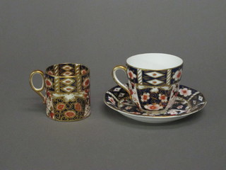 A Royal Crown Derby cup and saucer, cup cracked, and a Derby  style mug