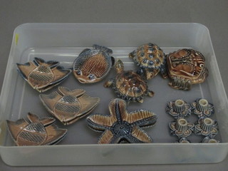2 Wade figures of tortoises, do. crab, 2 do. Starfish ashtrays, 6 Wade candlesticks and 7 ashtrays in the form of fish
