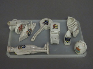 A crested china model of a hand grenade, do. shell, boat,  Howitzer and Dreadnought and 3 other items