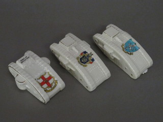 A Willow crested china model of a WWI tank decorated The  Arms of The City of Lincoln and 2 other Academy crested china  models of tanks with the Arms of Brighton and Horsham