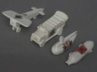 A Carlton crested china model of an airship decorated Arms of Stanford, do. submarine - Arms of City of London, a motor  coach and an aeroplane