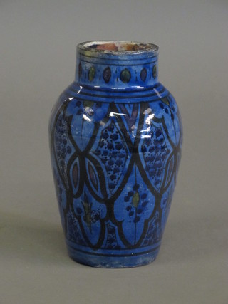 A Persian style blue glazed vase 7"