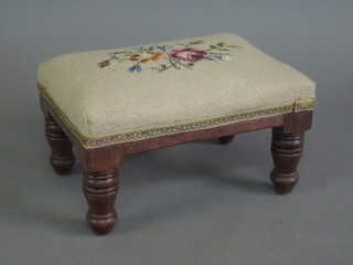 A Victorian rectangular walnut footstool with Berlin woolwork  seat 12"