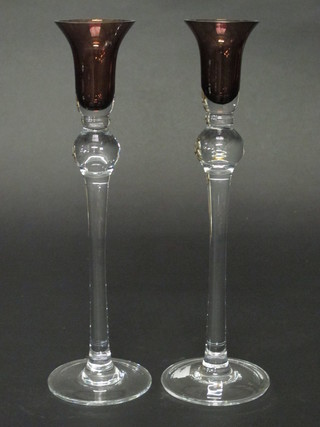 A pair of tall glass candlesticks 11"