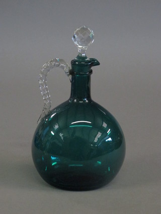A green glass ewer and stopper with clear glass handle 9"
