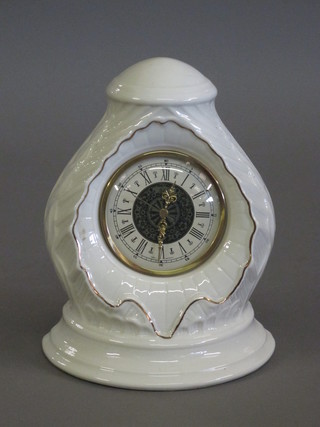 A Beleek mantel clock, the reverse with brown mark 9"