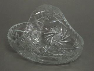 A circular cut glass basket 9"