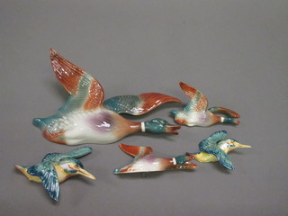 2 Beswick wall plaques in the form flying King Fishers 6"  together with a flight of 3 pottery wall ducks