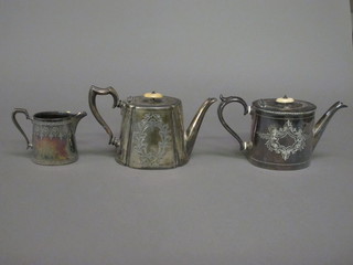 2 oval Britannia metal teapots and a do. cream jug