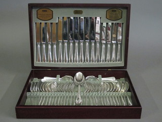 A canteen of silver plated Old English pattern silver plated flatware with bead decoration by Viners