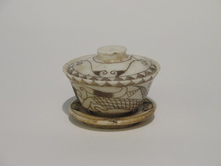 An Oriental carved hardstone rice bowl, cover and stand 2"