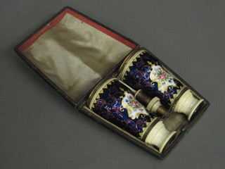 A handsome pair of 19th Century enamelled and ivory opera  glasses, some damage to the enamel, cased