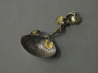 A Victorian silver scallop shaped caddy spoon London 1859
