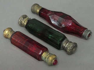 A green glass double ended scent bottle with plated mounts  together with 2 red glass double ended scent bottles