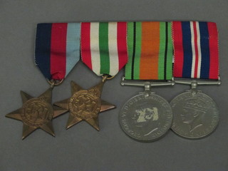 A group of 4 medals comprising 1939-45 Star, Italy Star,  Defence and War medal