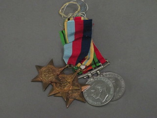 A group of 5 medals comprising 1939-45 Star, Africa Star, Italy Star, Defence and War medal