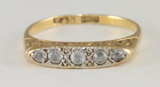 A lady's 18ct yellow gold dress ring set diamonds