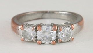 A lady's dress ring set 3 diamonds