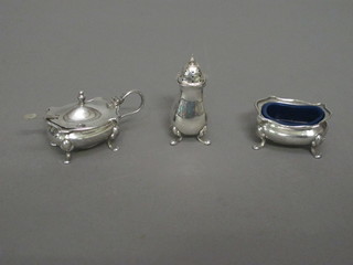 A silver 2 piece condiment set comprising mustard and salt,  marks rubbed, 2 ozs, together with a silver plated pepper