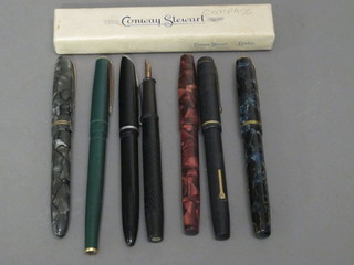 A Persian style lacquered box containing a New Bond Easiflow fountain pen no.333, 2 Burnham fountain pens - no.48 and  no.55, a Conway Stewart no.759 fountain pen, a bla ck Platignum fountain pen, a green fountain pen, 1 other, a pair  of compasses