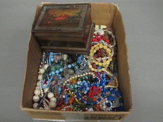 A collection of beads and costume jewellery