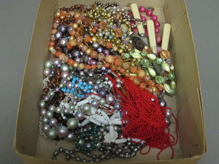 A collection of beads, plated items etc