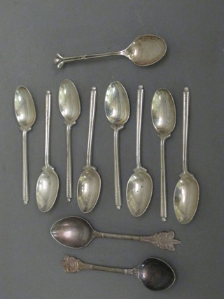 9 silver spoons with golfing motifs 3 ozs and 2 silver plated  spoons decorated Boy Scouts motif