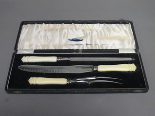 A 3 piece carving set comprising knife fork and steel