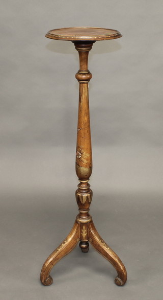 A turned mahogany and lacquered decorated torchere