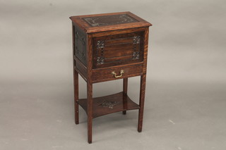 A rectangular carved oak sewing box with hinged lid, the base  fitted a drawer with undertier, raised on square supports 16"