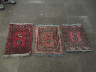 3 red Afghan slip rugs with 2 octagons to the centre 24" x 19"