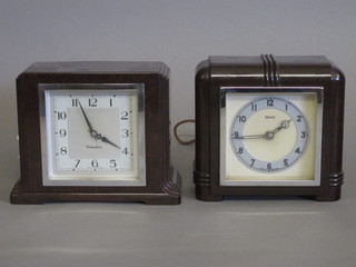 An Art Deco electric mantel clock by Genalex contained in a  brown Bakelite case and 1 other by Ferranti