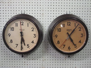 2 Smiths Sectric electric wall clocks contained in brown Bakelite  cases 10"