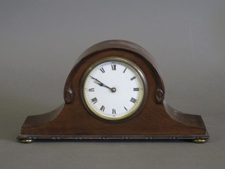 A bedroom timepiece with enamelled dial and Roman numerals  contained in a mahogany Admiral's hat shaped case 11"