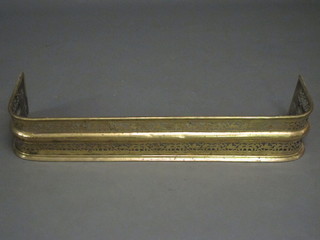 A 19th Century pierced brass fender 41"