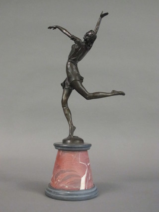 An Art Deco style bronze figure of a dancing girl, raised on a tapering base 25"