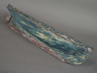 A wooden model boat hull 36"