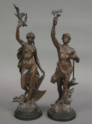 A pair of 19th Century Continental spelter figures depicting Industry 22"
