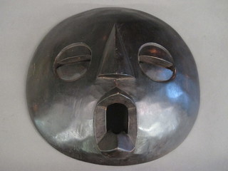 A carved wooden African wall mask 12"