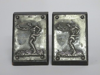 A pair of Art Nouveau ebonised and pewter bookends decorated  an athlete wrestling a serpent 6"