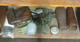 2 pairs of leather gaiters and various items of military webbing  etc