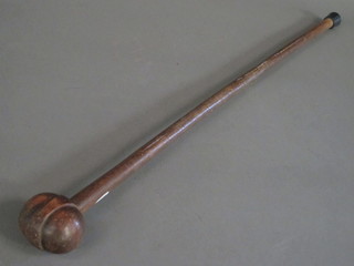 A wooden knobkerry style cane