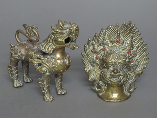 A brass figure of a Dog of Fo 5" and an Eastern bronze and  jewel studded mask 6"  ILLUSTRATED