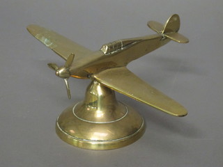 A brass model of a Spitfire 9"