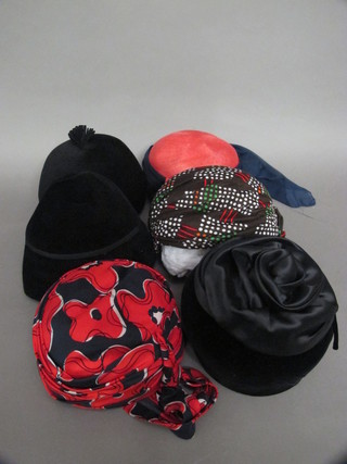 A lady's circular black velvet and silk hat by Edna Wallis and 1 other, 1 other by Henderson of Liverpool and 3 other hats