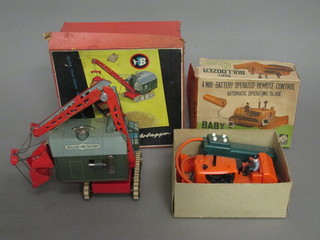 A Biller tin plate model crane, boxed, together with a Codeg  battery operated Bulldozer, boxed,