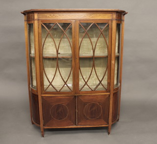 An Edwardian inlaid mahogany D shaped display cabinet, fitted shelves enclosed by astragal glazed panelled doors, raised on  square tapering supports 42"