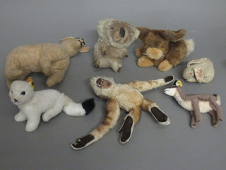 A Steiff figure of a cat? together with a collection of other cuddly  toys